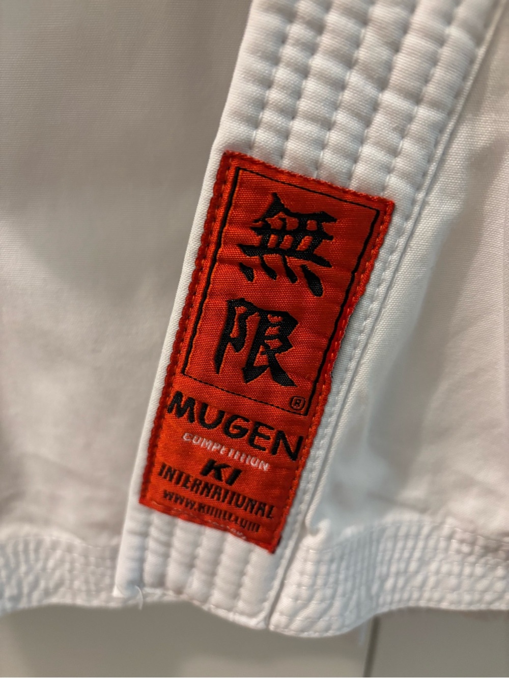 Mugen Orange Label Karate Gi with AAU Patch